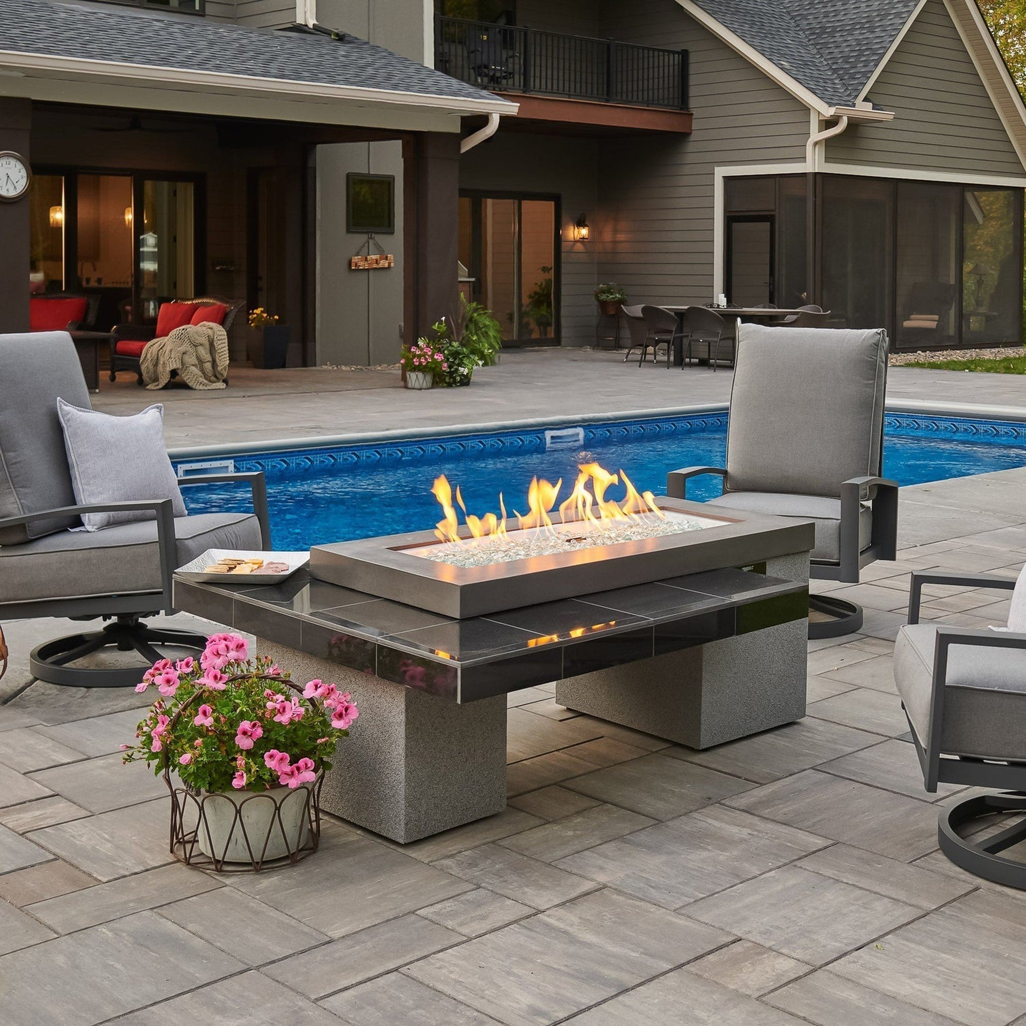 The Outdoor GreatRoom Company Uptown 64" Linear Gas Fire Pit Table with Midnight Mist Top